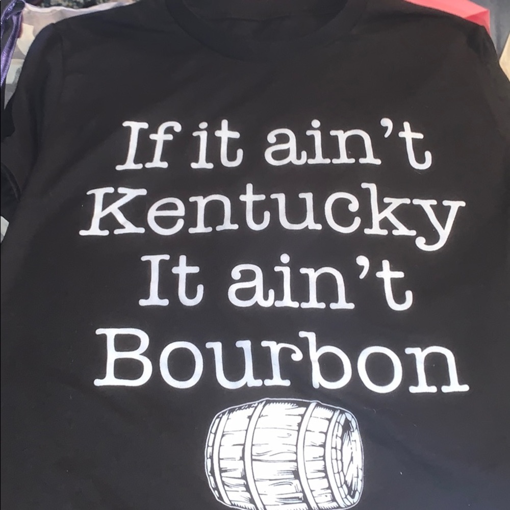 Black shirt with white lettering